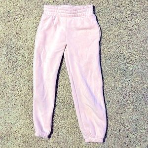 Rosa sweats or light purple sweats look pink in real life no holes no rips.
